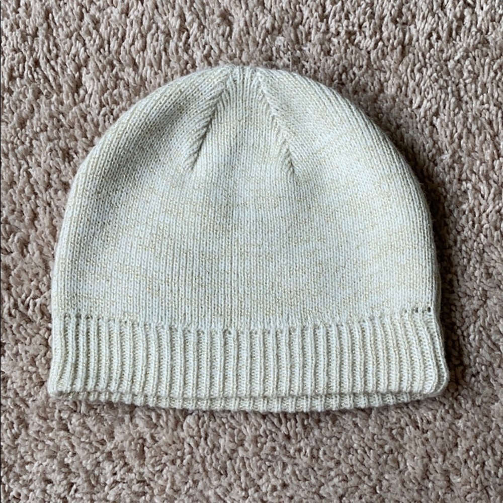 Fairly new white / cream winter hat